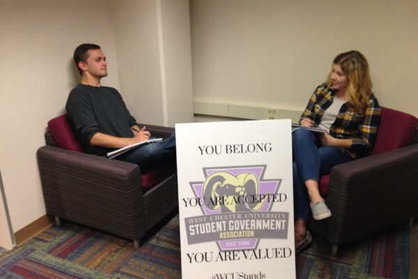 Student Government President and Secretary discussing their plans moving forward to stand against hate at West Chester University