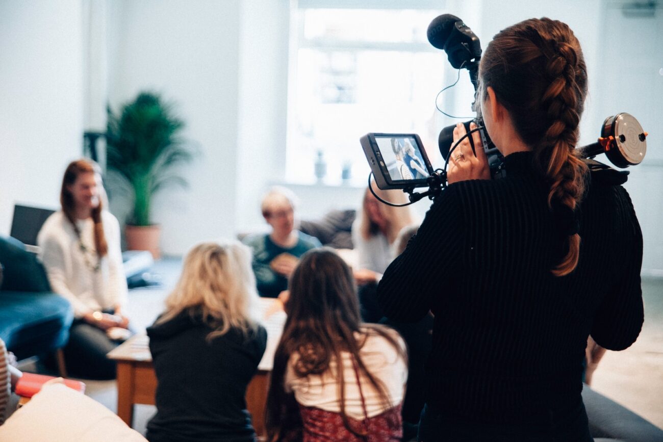 A women filming content for media